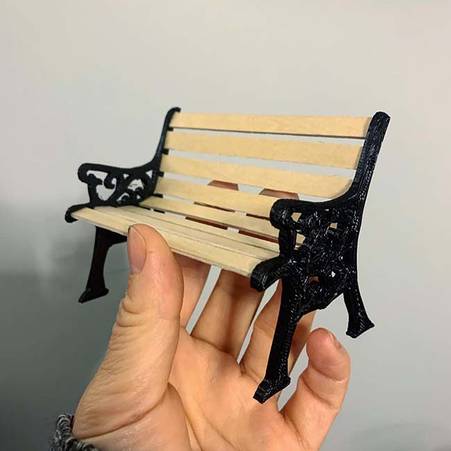 3D printed <q>cast iron</q> with wooden slats.